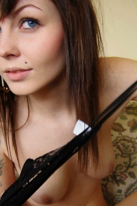 Cute teen babe with tattoos