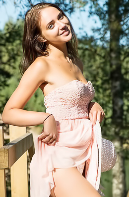 Amazing brunette is happy to get naked