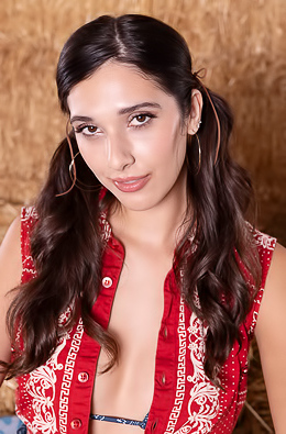 Aria Sloane American Brunette Swishes Her Long Pigtails With A Sassy Smile