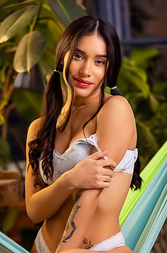Carolina Guerrero | Dark-Haired Nude Posing On Hammock