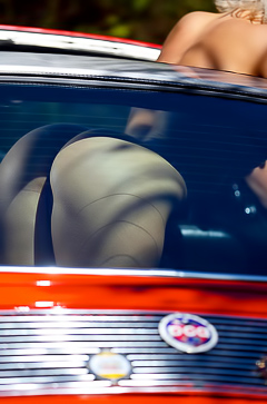 Amalie Olufsen Rides A Red Car Nude By The Sun
